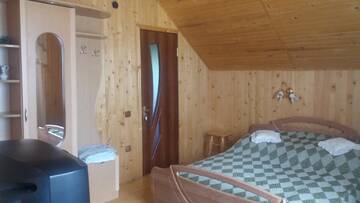 Фото номера Двухместный номер с 1 кроватью Гостевой дом Котеджі "Хата Рибака" г. Косов 5